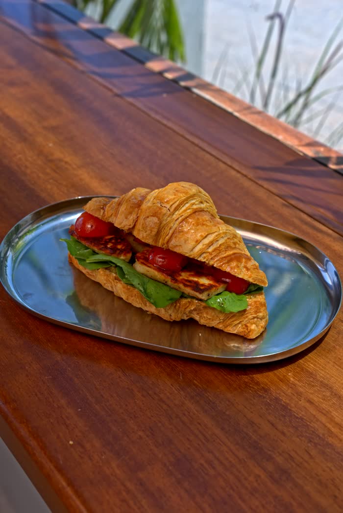 The Perk Cafe menu photography, halloumi croissant with tomato